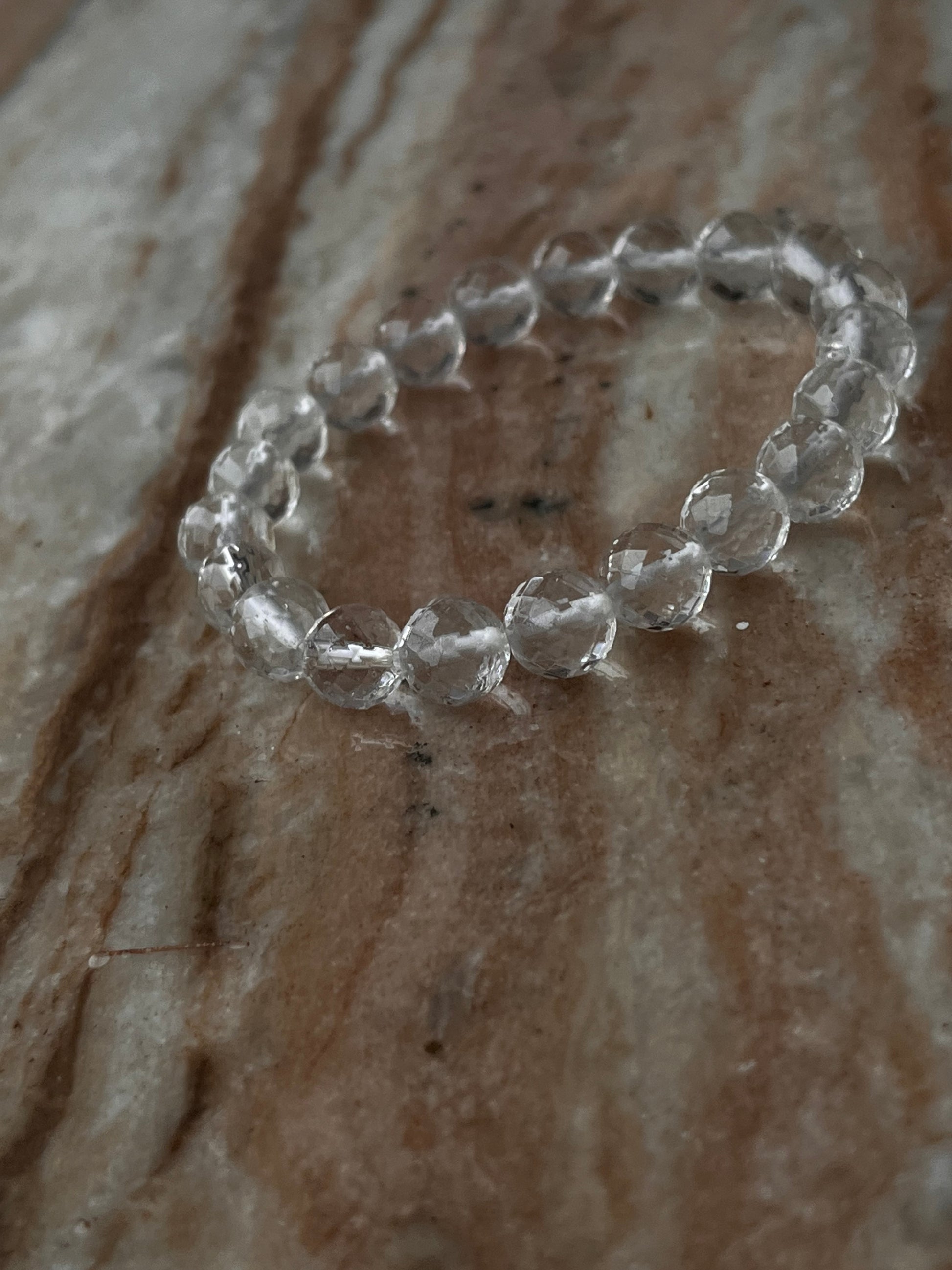 Natural clear quartz bracelet with 8mm diamond cut beads  