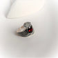 Sterling silver ring featuring a garnet gemstone and leaf wrap design