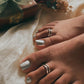 Close-up of double stack pure silver toe ring with refined detailing