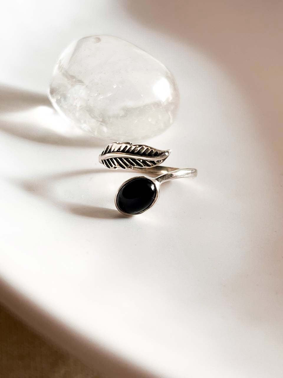 Exquisite black onyx feather adjustable ring in sterling silver.