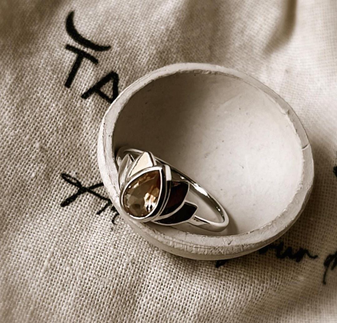 Beautiful divine lotus design silver ring featuring a citrine gemstone