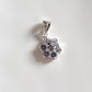Delicate tanzanite flower silver pendant