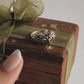 Close-up of fairy in the garden silver ring with magical garden motif