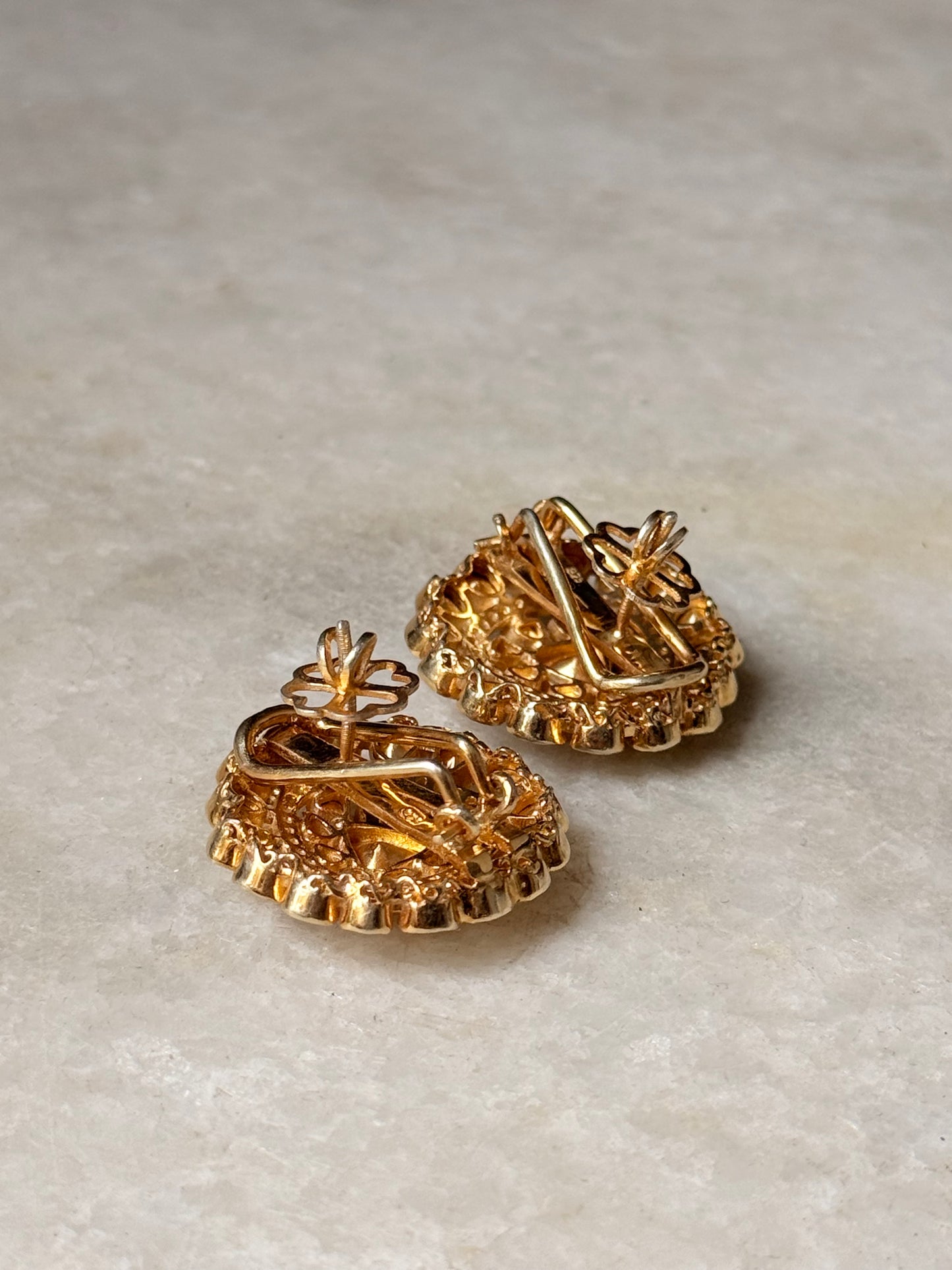 925 Sterling Silver Gold Plated Antique Moissanite Polki Earrings on a marble surface