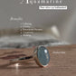 Elegant natural aquamarine oval silver ring with sleek design.