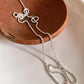Close-up of dot ball silver chain with smooth, polished spheres