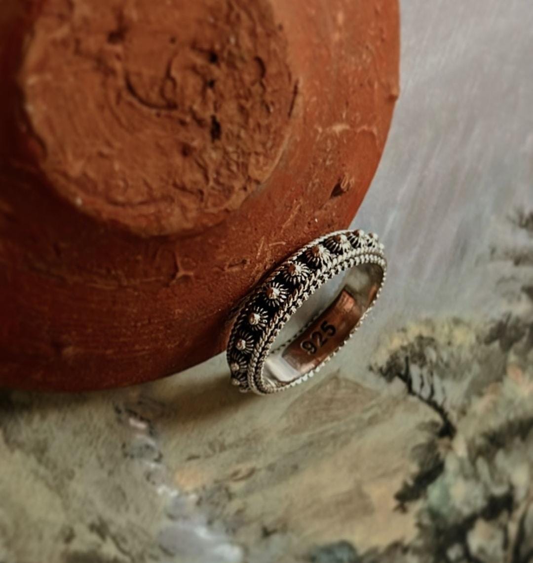 Traditional Balinese silver ring with a fixed size and detailed artistry.