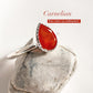 Carnelian pear-shaped stone set in a silver ring