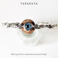 Elegant forest-inspired blue topaz statement bangle in 925 silver