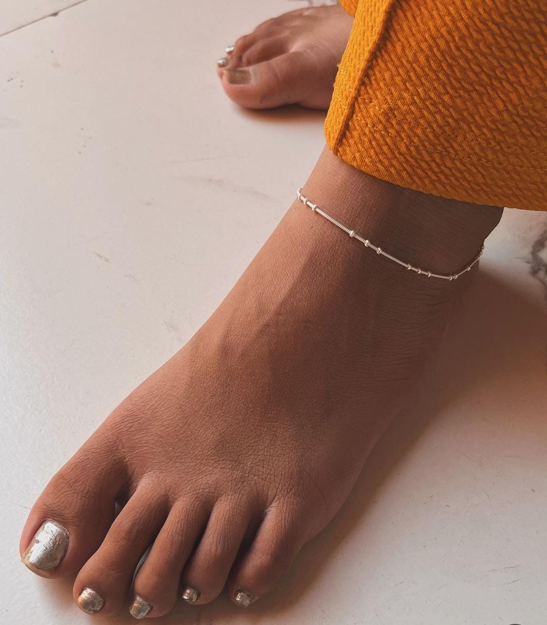 Delicate Chelsi snake dot design anklet in high-quality silver 925