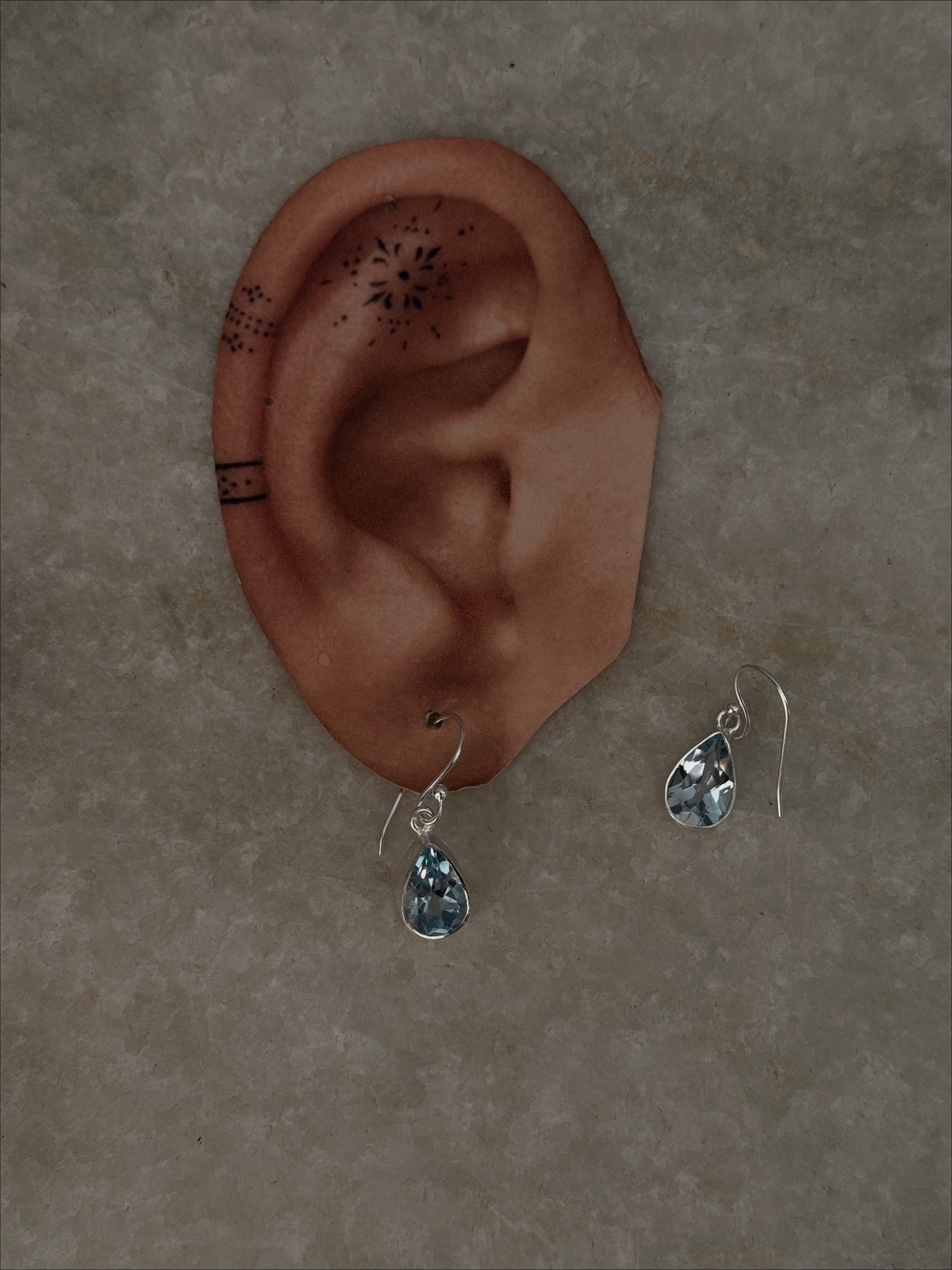 Elegant plain pear blue topaz drop silver earrings