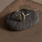 Sleek and stylish cowrie seashell set in a polished silver ring