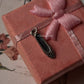 Sterling silver charm in the shape of princess shoes