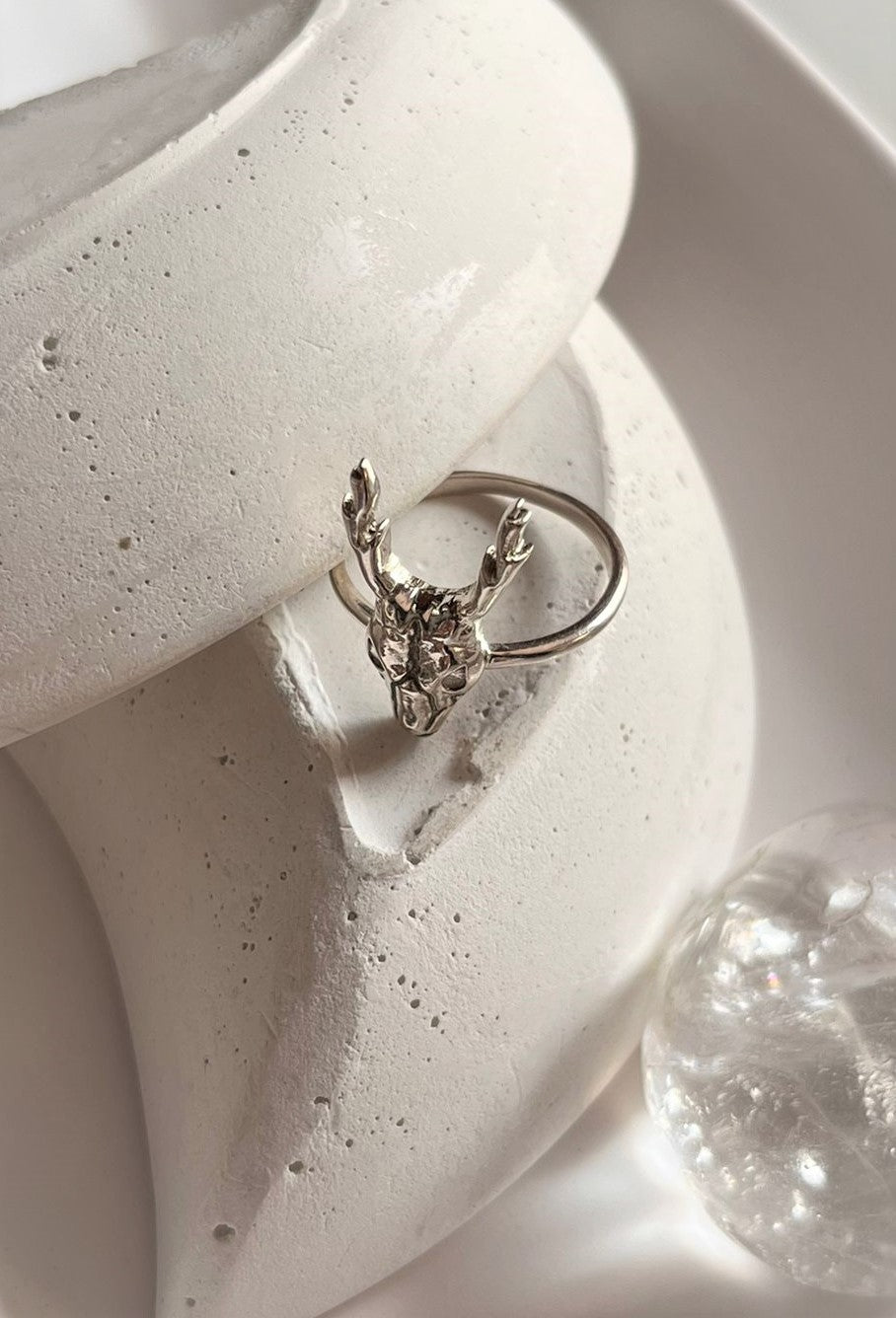 Timeless silver ring featuring a bold deer skull centerpiece