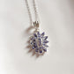 Trendy tanzanite flower statement pendant in silver