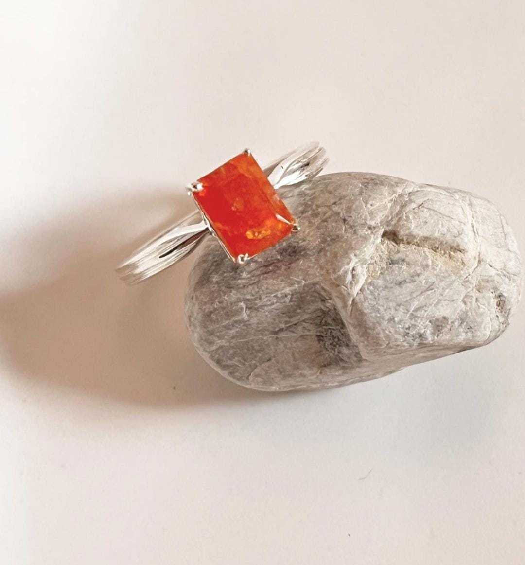 Modern carnelian rectangular stone mounted on a silver ring band