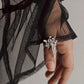 Sterling silver adjustable ring featuring a delicate angel design.