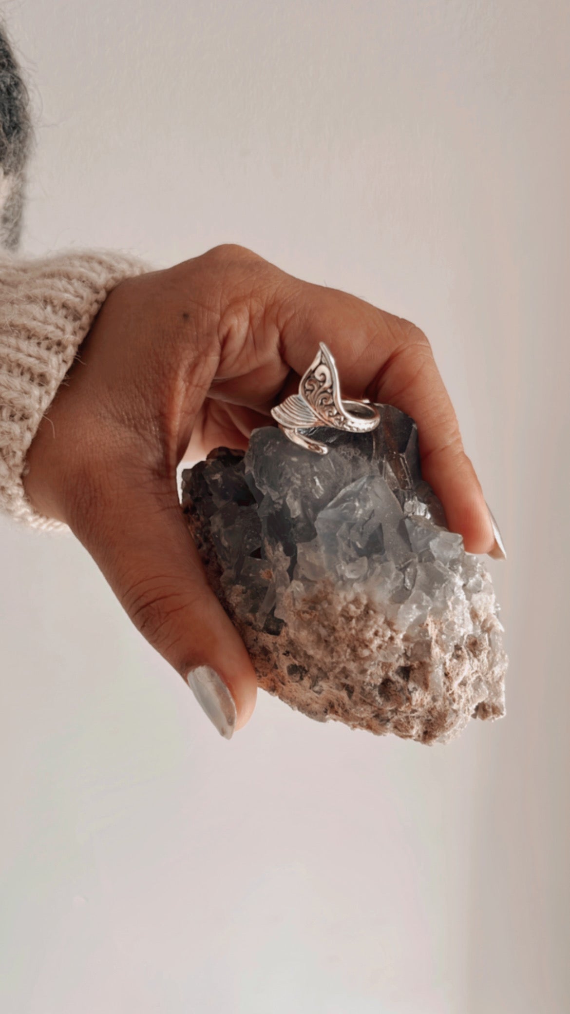 Charming fish tail silver ring featuring a sleek, aquatic design