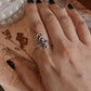 Handcrafted silver ring with spiral detailing