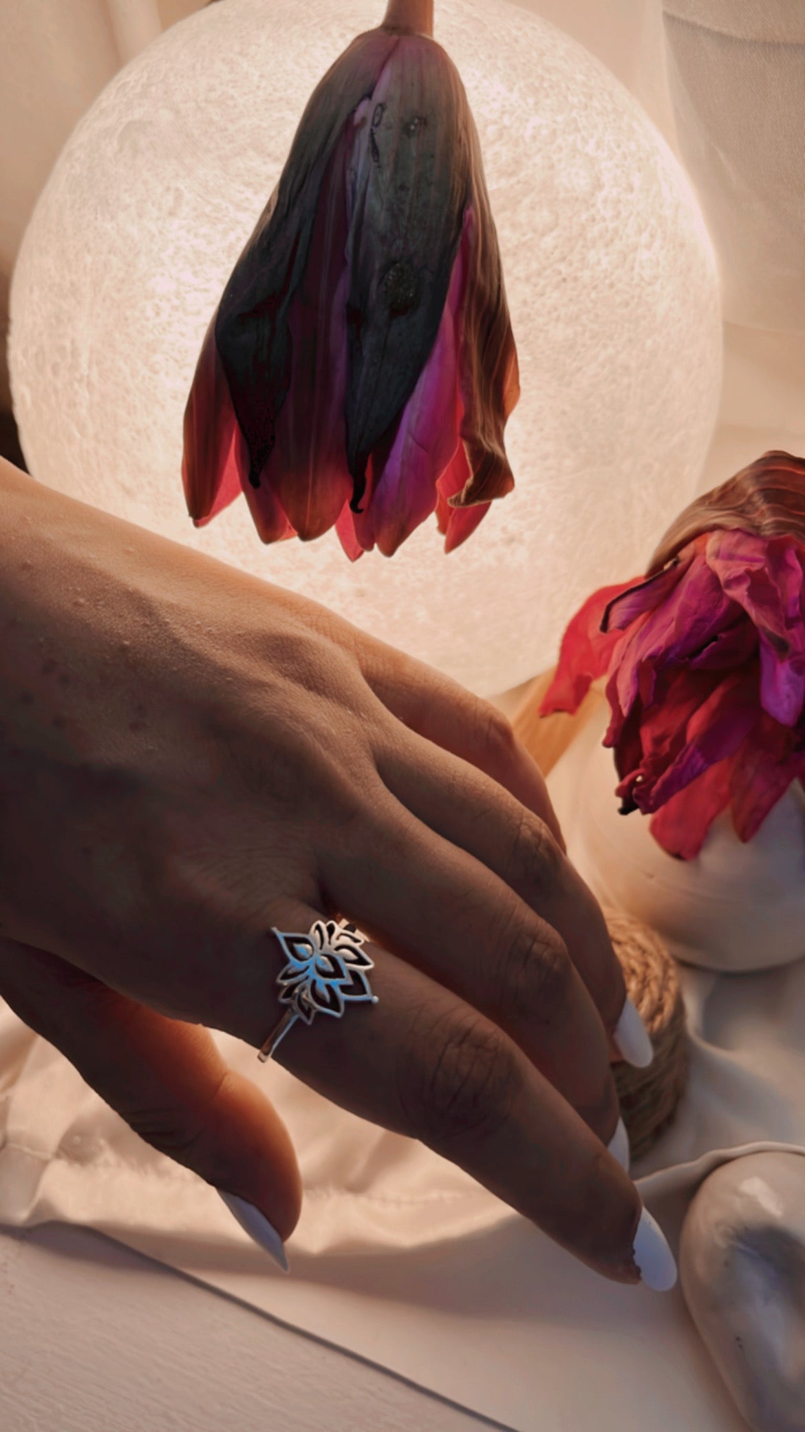 Elegant small lotus flower ring in polished silver