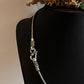 Timeless sterling silver chain with a detailed antique S-lock clasp.