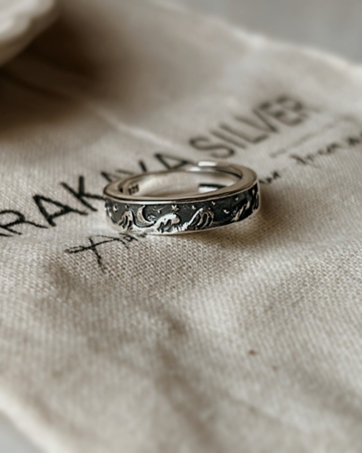 Cosmic Adjustable Silver Ring with Moon, Waves, and Stars Design