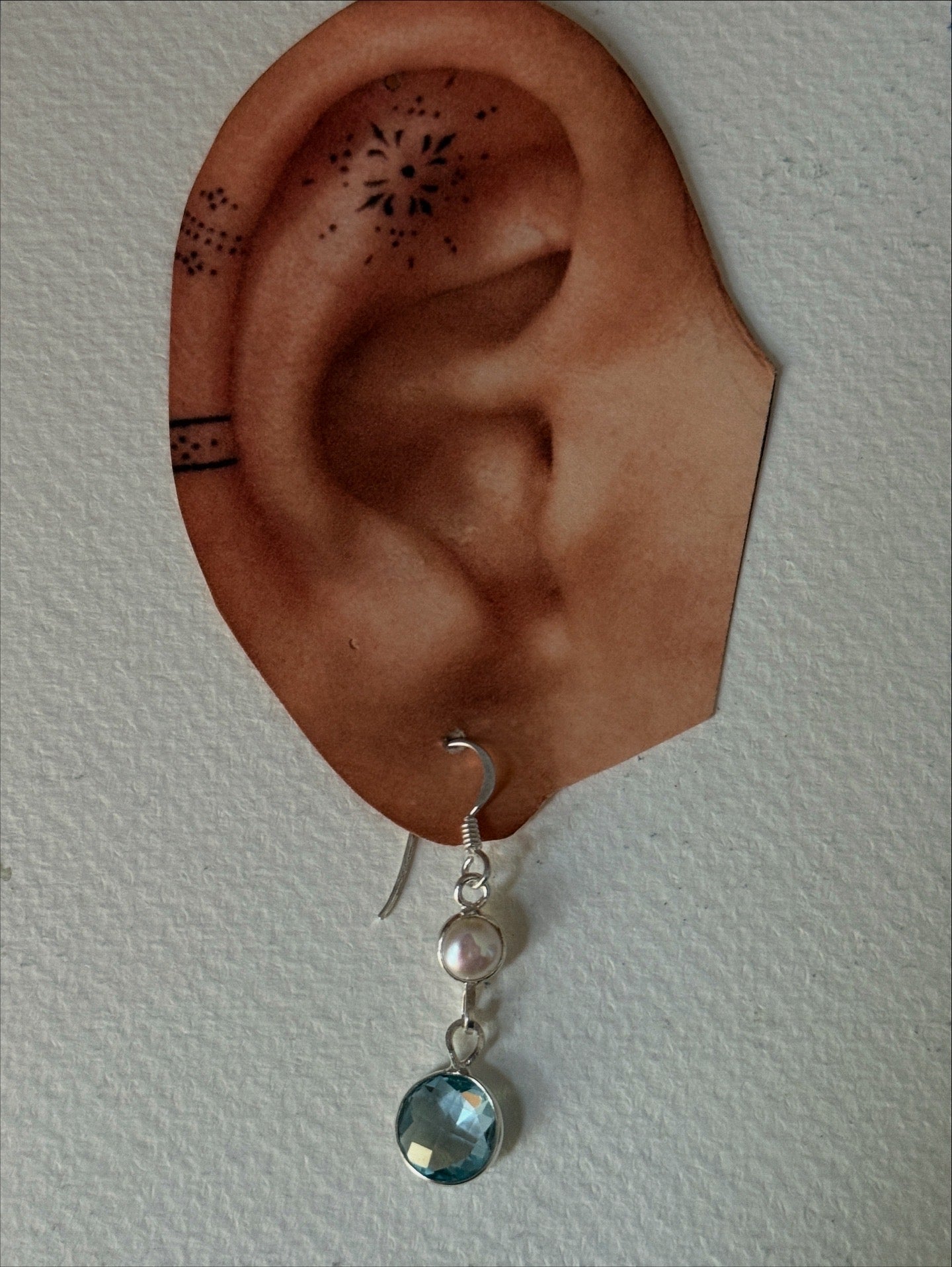 Blue topaz and pearl drop earrings in sterling silver