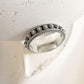 Elegant Balinese fixed size silver ring with intricate design.