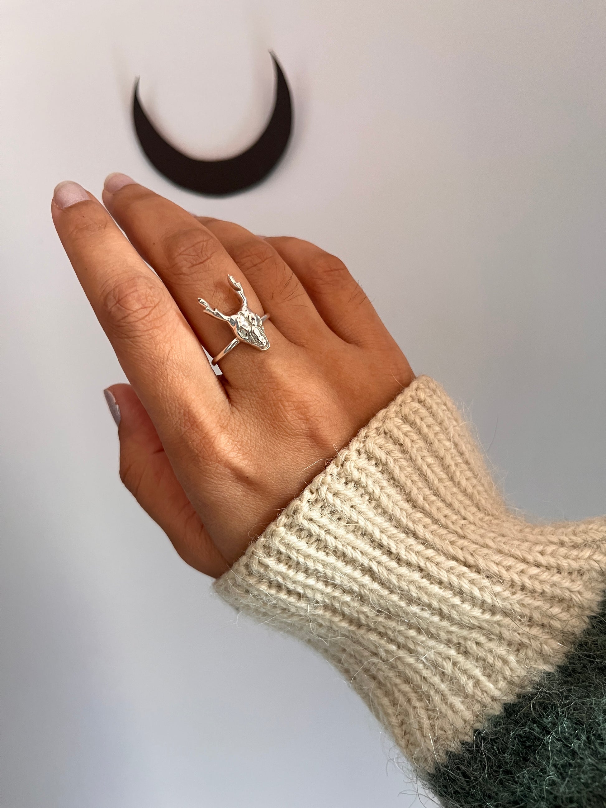 Close-up of deer skull ring in fine sterling silver