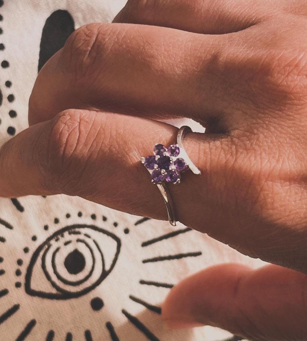Handcrafted Silver Ring with Amethyst and Floral Detailing