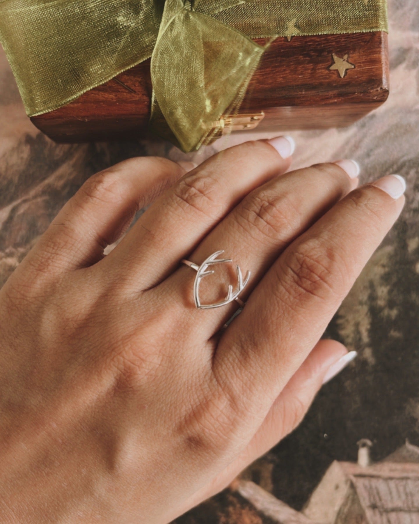 Antler-shaped silver ring with a minimalist yet bold design.