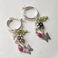 Delicate silver hoops with peridot, pearl, and pink tourmaline charms  
