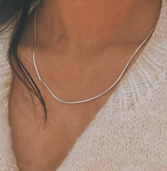 Sleek flat snake silver chain with smooth, polished links