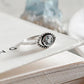 Handcrafted evil eye silver ring with blue topaz for spiritual protection