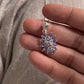 Charming tanzanite flower pendant with sterling silver