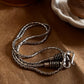 Sterling silver chain featuring a unique antique S-lock clasp.