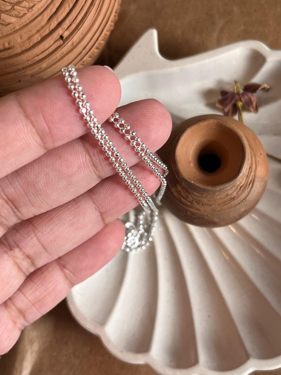 Modern dot ball silver chain with a polished and elegant look