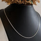 Modern curb minimal silver chain with a simple and refined look