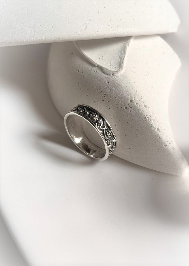 Timeless floral engraved band silver ring with smooth, polished finish