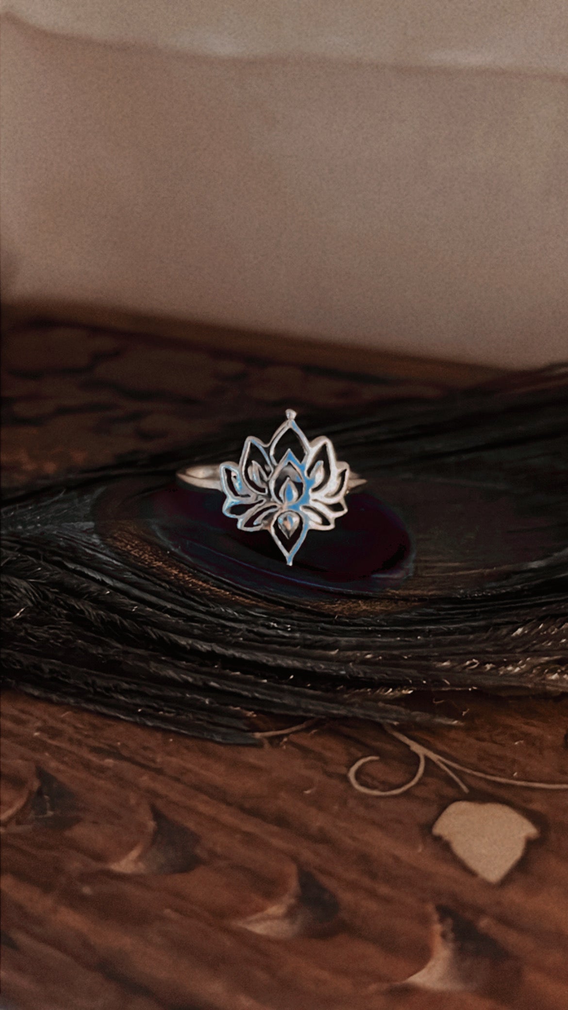 Sleek silver band with divine lotus design