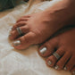Unique antique wavy Rawa toe ring in pure silver with tribal flair.