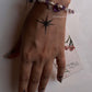 Celestial-themed silver bracelet with amethyst moon charm  