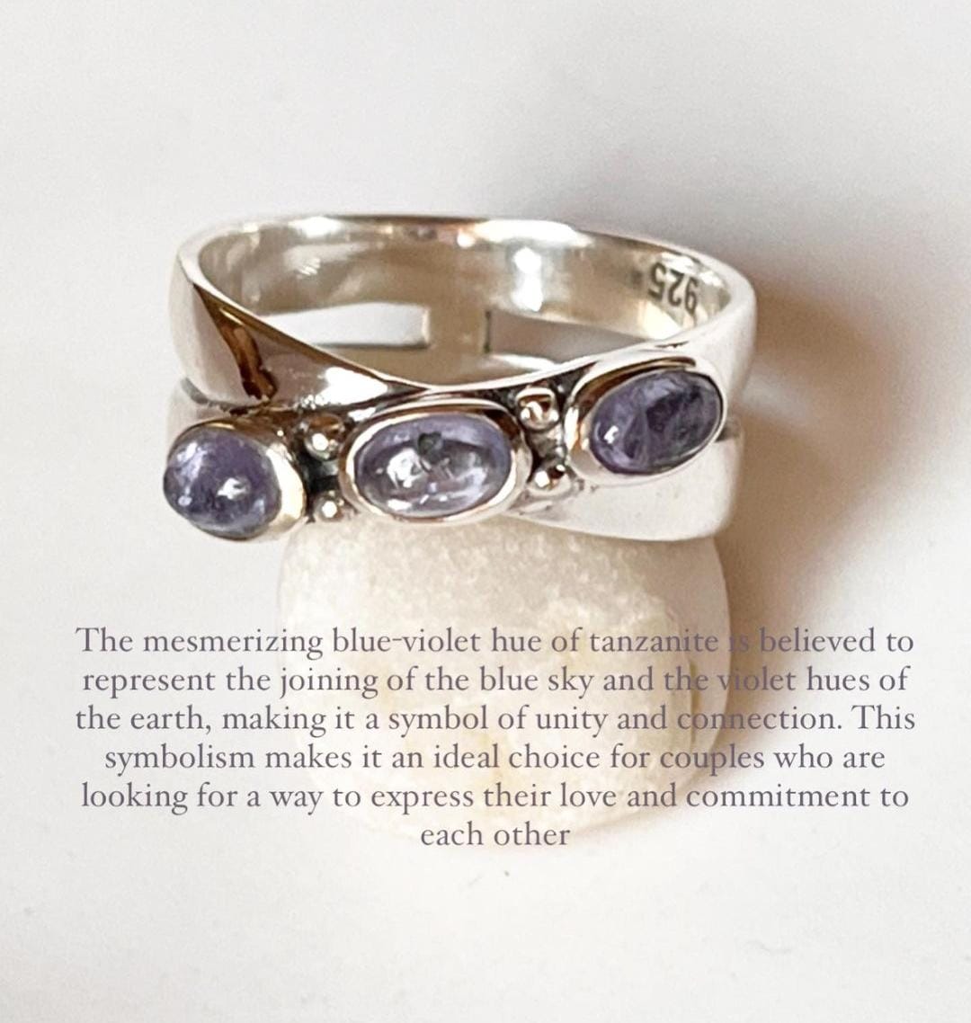 Tanzanite cross band ring with silver band design