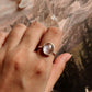 Handcrafted sterling silver ring with oval rose quartz stone
