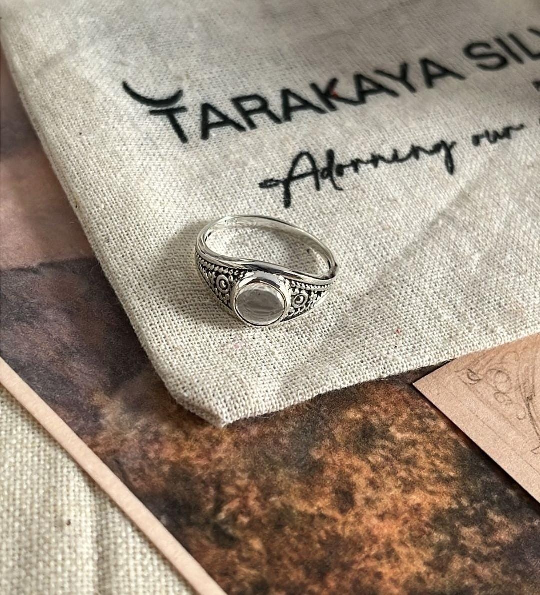 Timeless clear quartz round silver ring with bohemian flair
