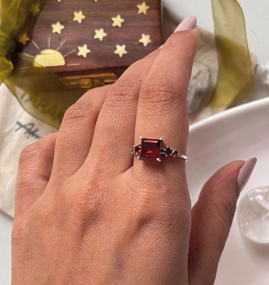 Antique-style silver ring with a square-cut garnet gemstone
