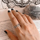 Charming silver ring with vines and leaf pattern