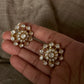 925 Sterling Silver Gold Plated Antique Moissanite Polki Earrings in hand, showcasing floral design and elegance.