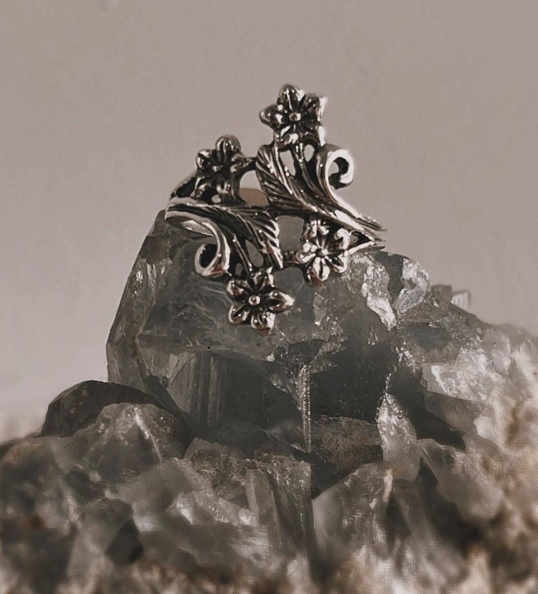 Close-up of detailed forest vintage 925 silver ring with nature-inspired elements