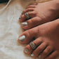 Sleek and elegant tribal Rawa silver toe ring with antique finish.